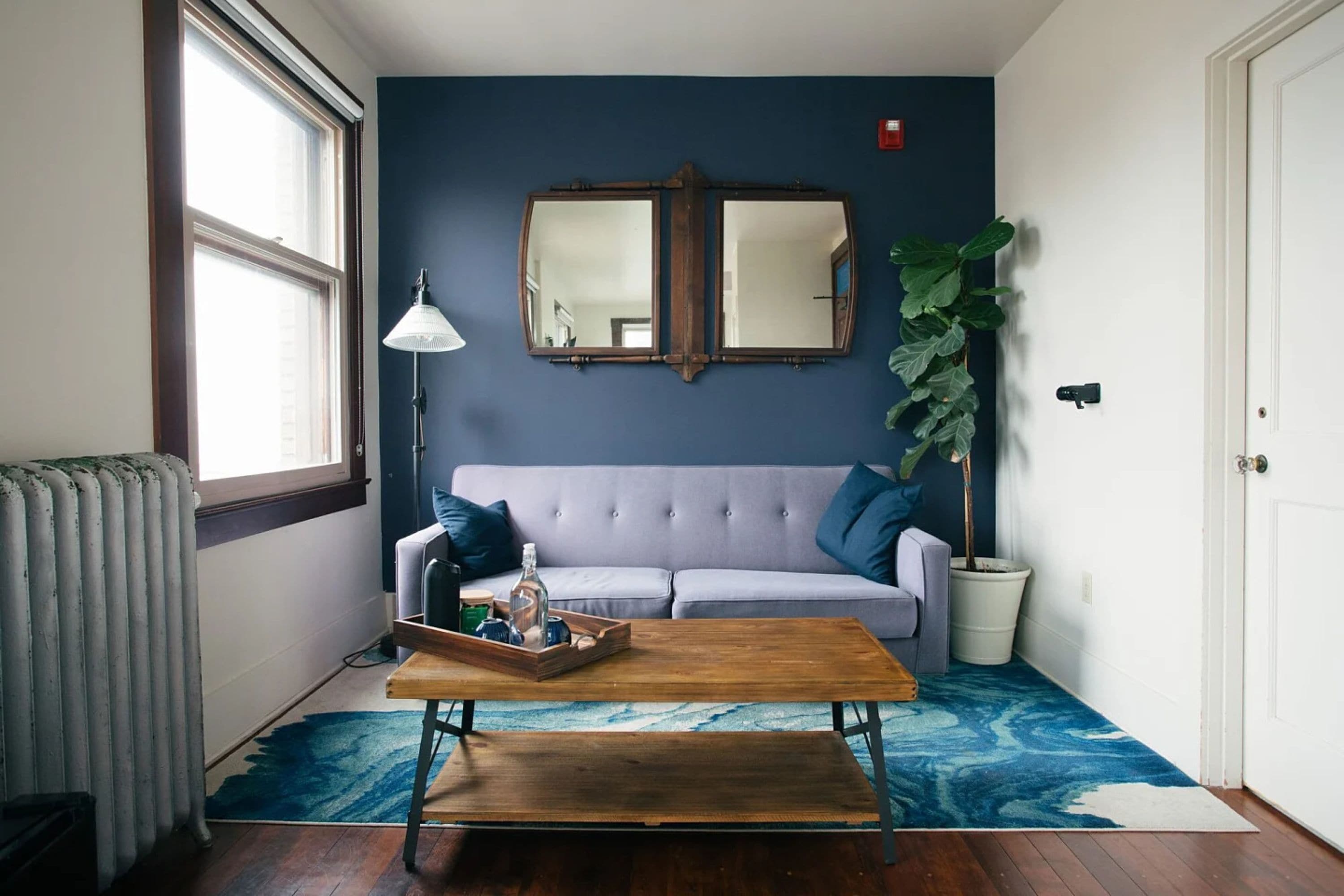 deluxe room | living area | flat-screen tv, dvd player, video library