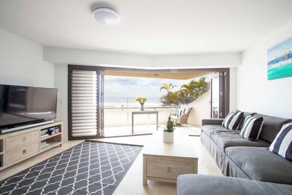 2 Bedroom Oceanview + Study | Living area | Flat-screen TV, DVD player