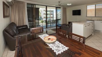 Deluxe 2 Bedroom Apartment - Ocean View | Living area | Flat-screen TV, DVD player, pay films