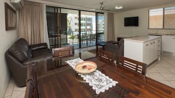 Deluxe 2 Bedroom Apartment - Ocean View | Living area | Flat-screen TV, DVD player, pay movies