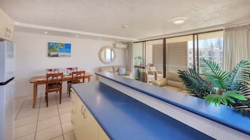 Deluxe 2 Bedroom Apartment - Ocean View | Living area | Flat-screen TV, DVD player, pay films
