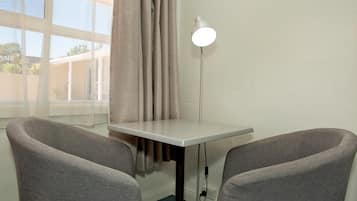 Double Room, 1 Queen Bed | Living room | 50-inch flat-screen TV with digital channels, TV