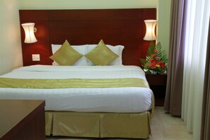 Ropa de cama de alta calidad y minibar 