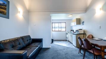 Family Apartment, 2 Bedrooms | Living area | Flat-screen TV