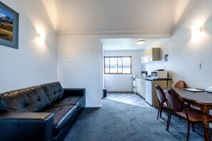 Family Apartment, 2 Bedrooms | Living area | Flat-screen TV - Centennial Court Hotel (Alexandra)