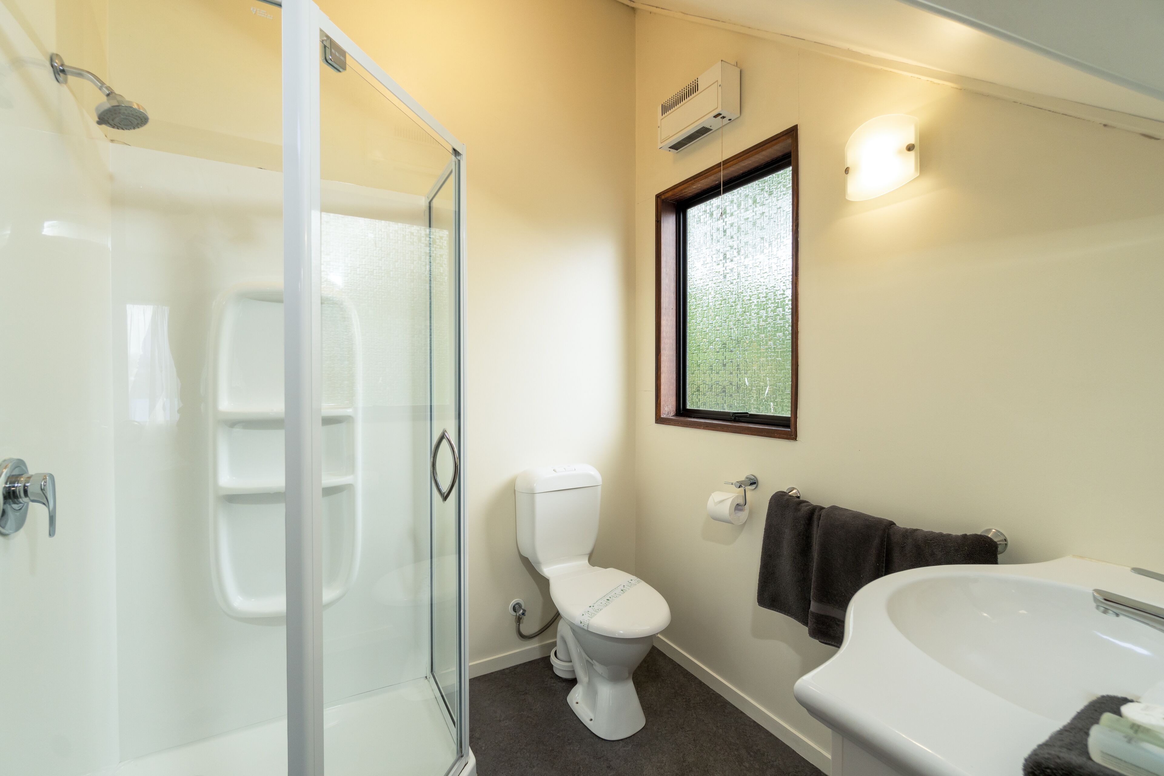 studio unit deluxe  | bathroom | free toiletries, hair dryer, towels