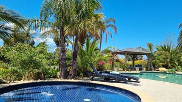 2 outdoor pools, open 9:00 AM to 9:00 PM, pool umbrellas, sun loungers