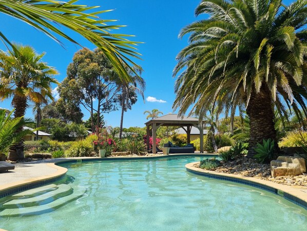 2 outdoor pools, open 9:00 AM to 9:00 PM, pool umbrellas, pool loungers