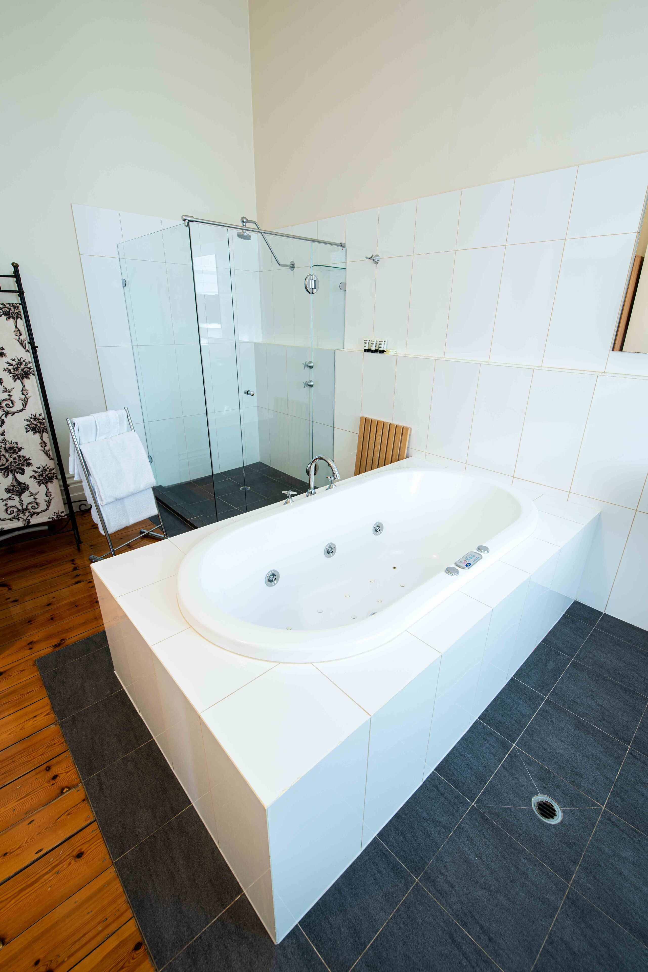 matthews suite | bathroom | shower, free toiletries, hair dryer, towels