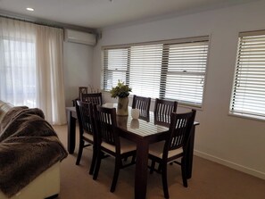 Standard Apartment, 2 Bedrooms | Dining room - Ocean Breeze Resort (Pauanui)