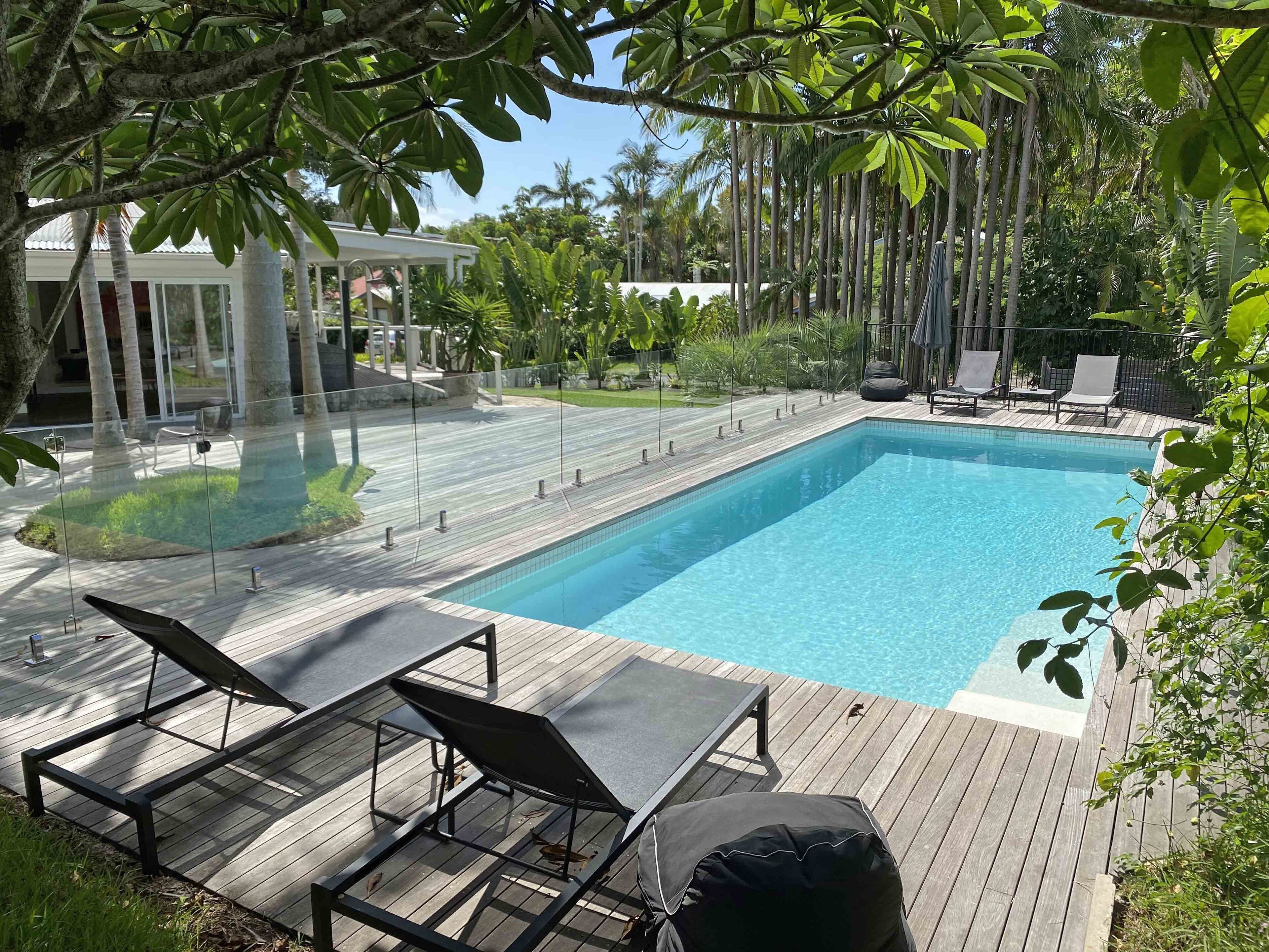 Outdoor pool, pool umbrellas, sun loungers