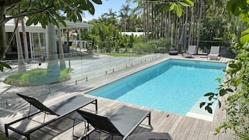Outdoor pool, pool umbrellas, sun loungers