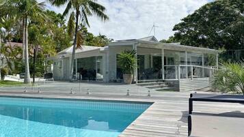 Outdoor pool, pool umbrellas, pool loungers