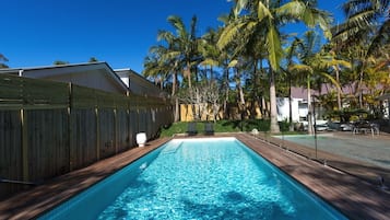 Outdoor pool, pool umbrellas, sun loungers