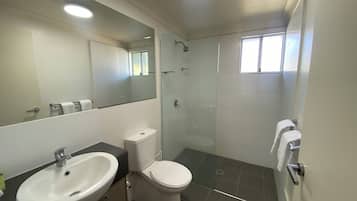 Family Room (1 Queen and 2 Single) | Bathroom | Shower, free toiletries, hair dryer, towels