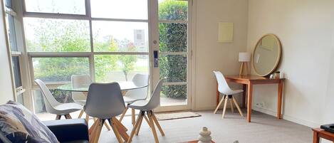 Deluxe Spa Lake View 1 | Living area | Flat-screen TV, DVD player