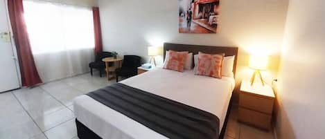 Premium bedding, desk, blackout curtains, iron/ironing board