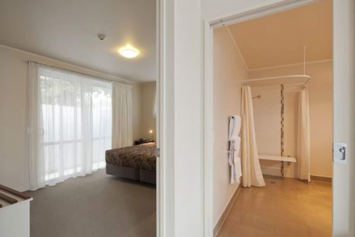 Premium bedding, blackout drapes, iron/ironing board, free WiFi