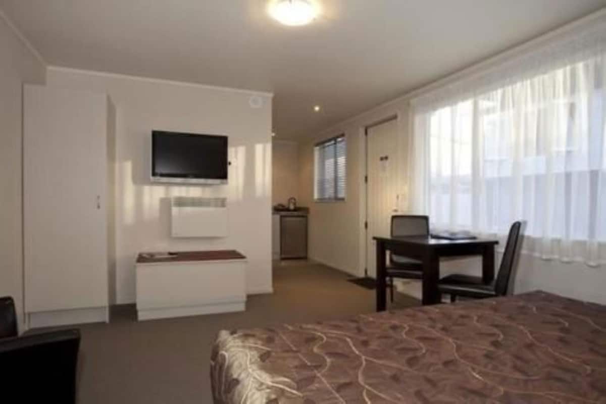 Premium bedding, blackout drapes, iron/ironing board, free WiFi