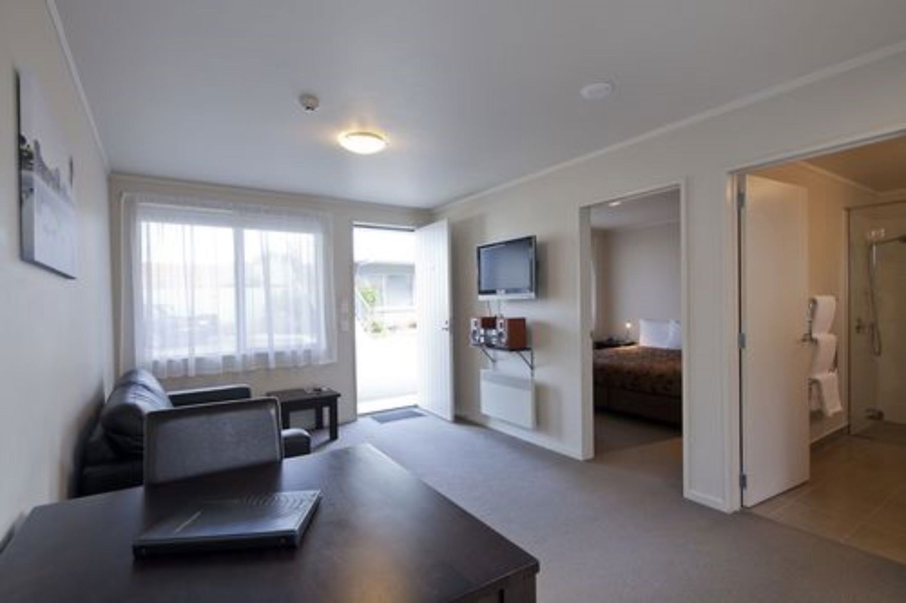 Premium bedding, blackout drapes, iron/ironing board, free WiFi