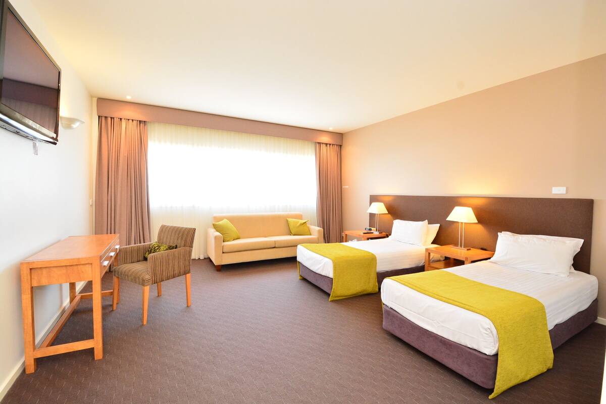 standard suite | living area | 42-inch plasma tv with digital channels, tv