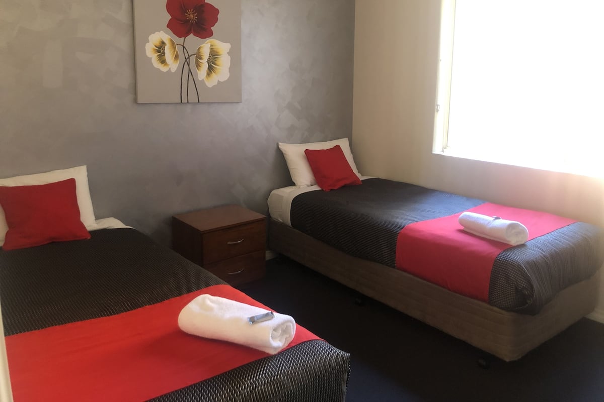 1 bedroom, individually decorated, blackout curtains, iron/ironing board