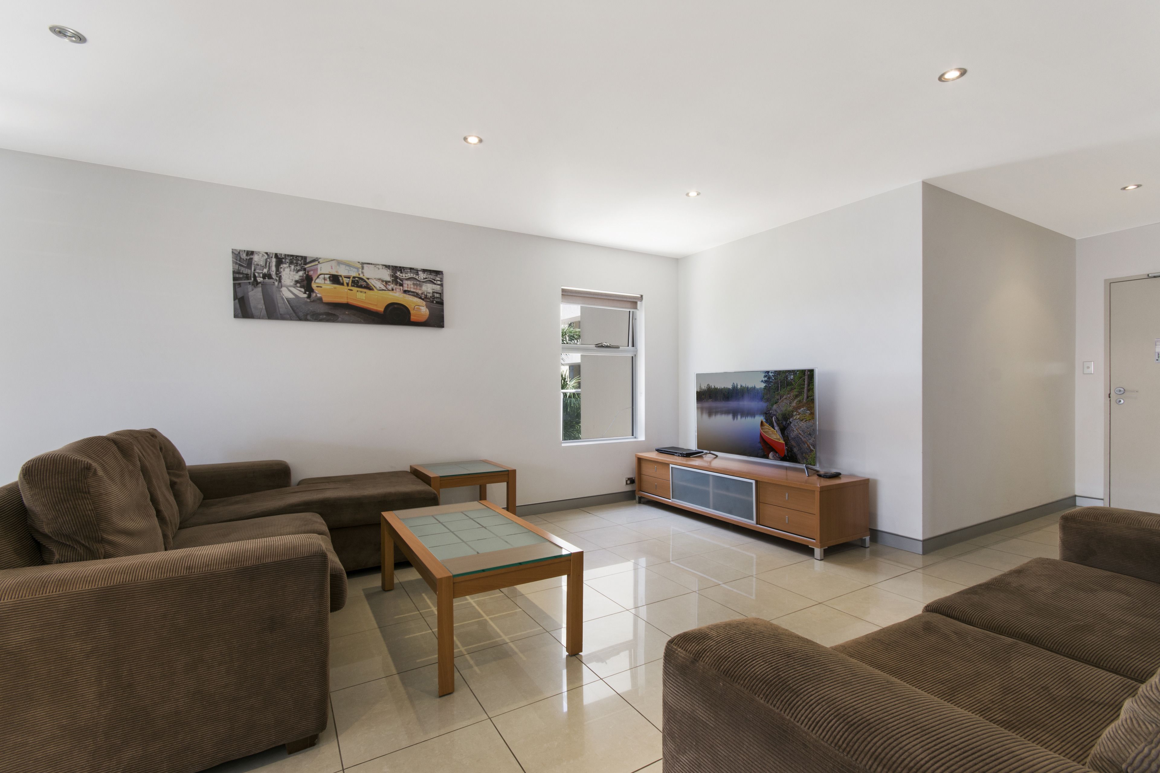 standard 2 bedroom apartment (1 bathroom) | living area | 55-inch flat-screen tv with digital channels, plasma tv