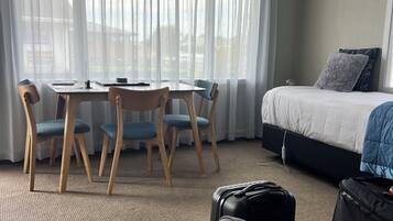 One Bedroom Unit | Living area | 49-inch TV with digital channels