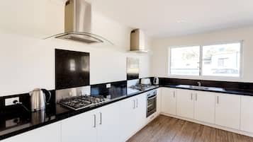 Paved Powered Site - No Bed Provided | Shared kitchen | Mini-fridge, microwave, coffee/tea maker, electric kettle