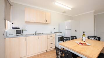 Microwave, electric kettle, toaster, cookware/dishes/utensils