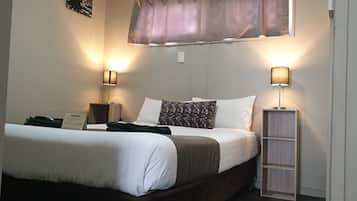 Desk, blackout curtains, iron/ironing board, rollaway beds