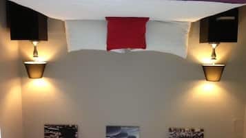 Desk, blackout curtains, iron/ironing board, rollaway beds