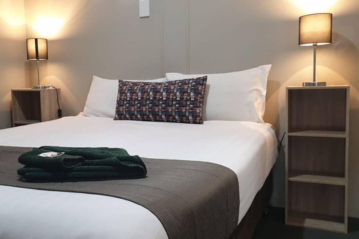 Standard Queen | Desk, blackout curtains, iron/ironing board, rollaway beds