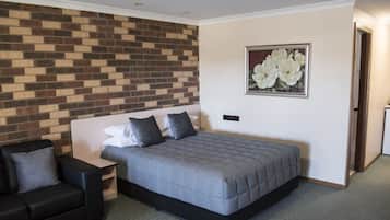 Desk, laptop workspace, blackout curtains, iron/ironing board