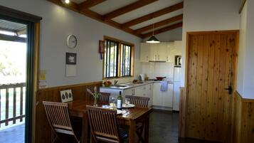 Full-size fridge, microwave, stovetop, coffee/tea maker