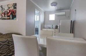Family Room, Non Smoking, Kitchenette | Living area | Flat-screen TV