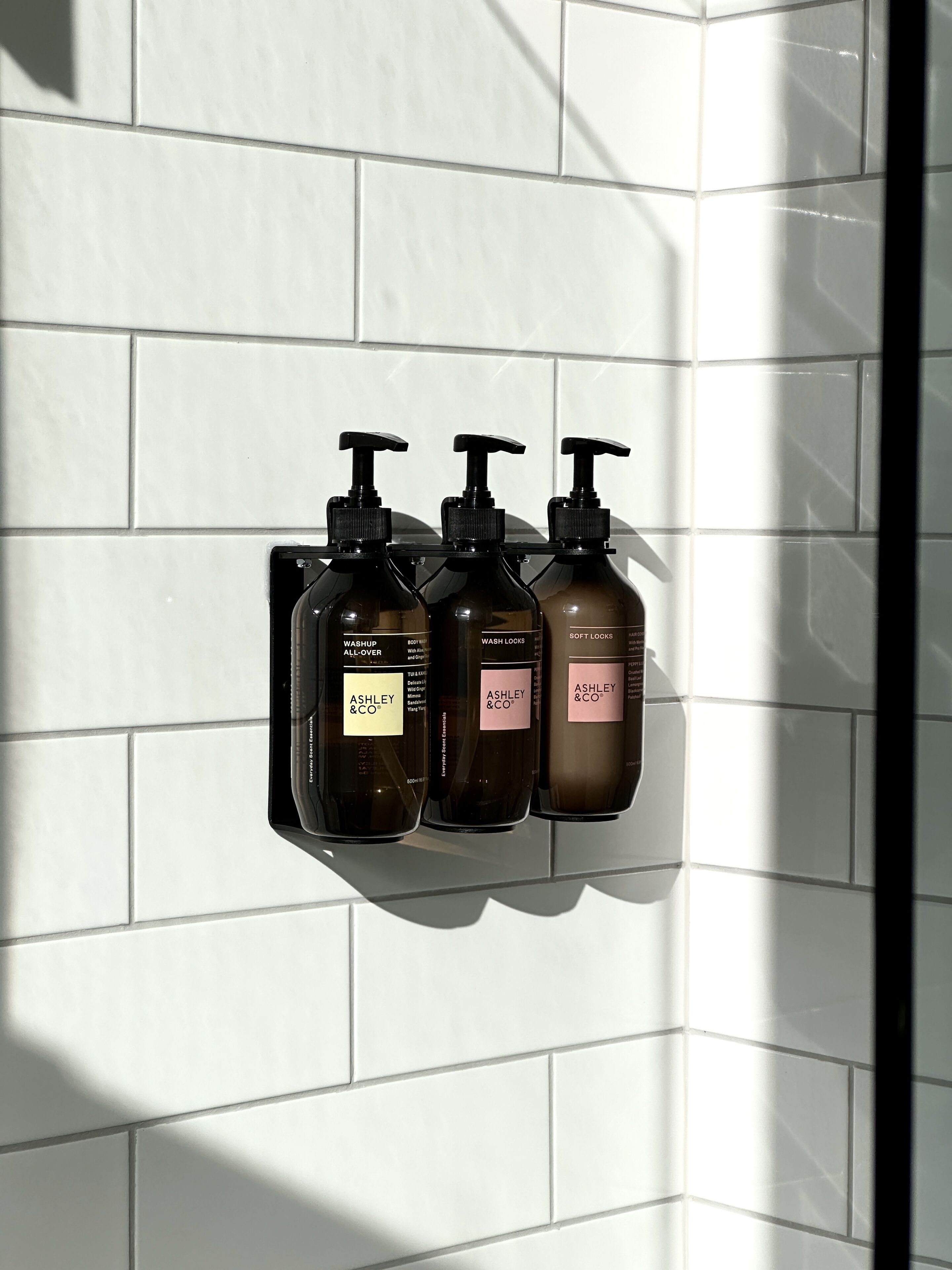 shower, designer toiletries, hair dryer, towels