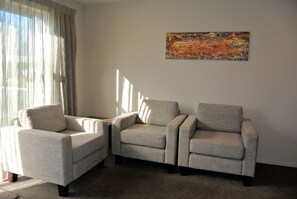 42-inch flat-screen TV with satellite channels, TV