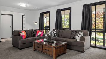 Deluxe Bungalow, 3 Bedrooms, Garden View | Living area | 30-inch flat-screen TV with digital channels