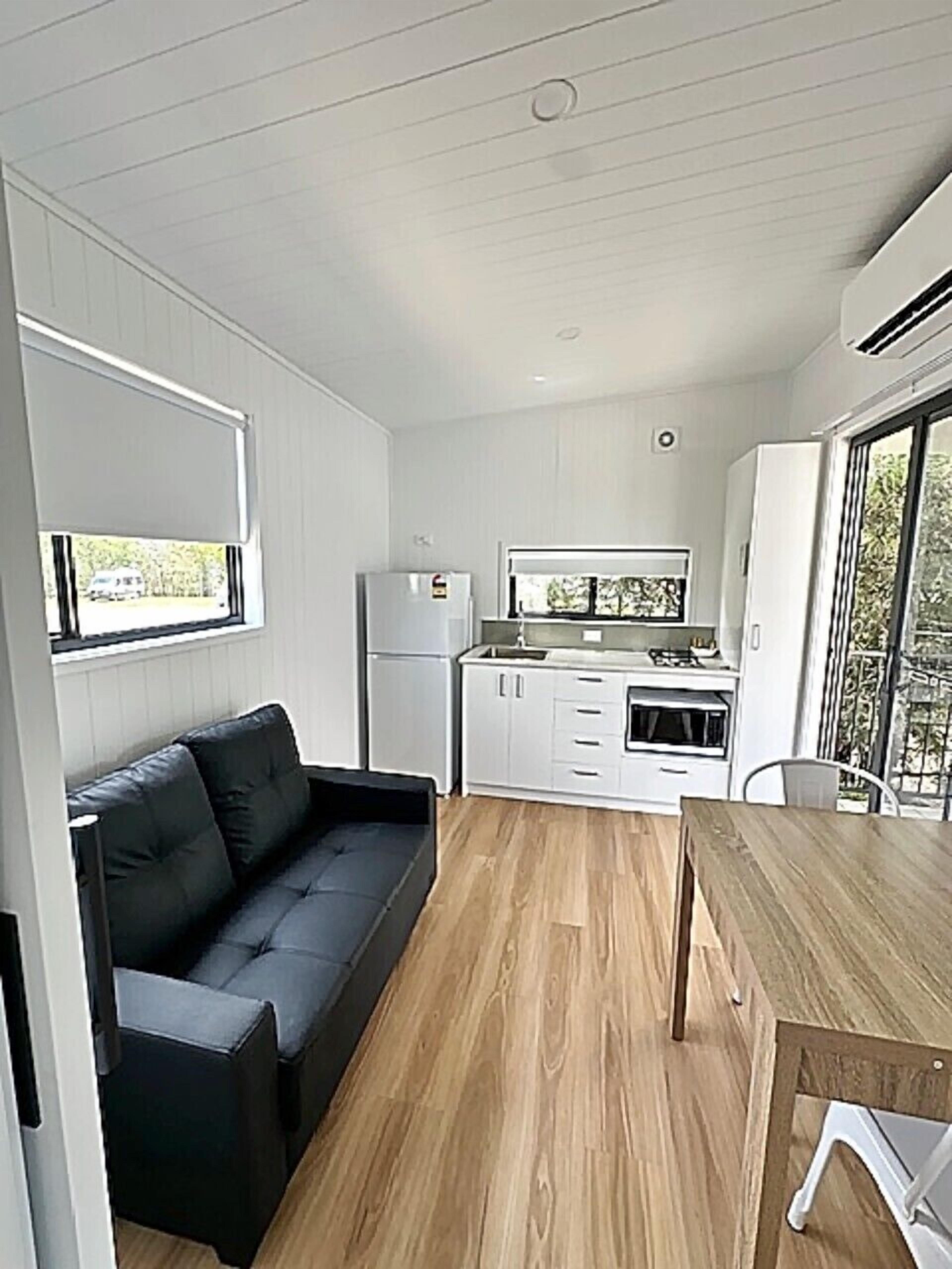 Standard Cabin, 1 Queen Bed | Living area | Flat-screen TV