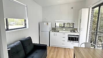 Standard Cabin, 1 Queen Bed | Living area | Flat-screen TV