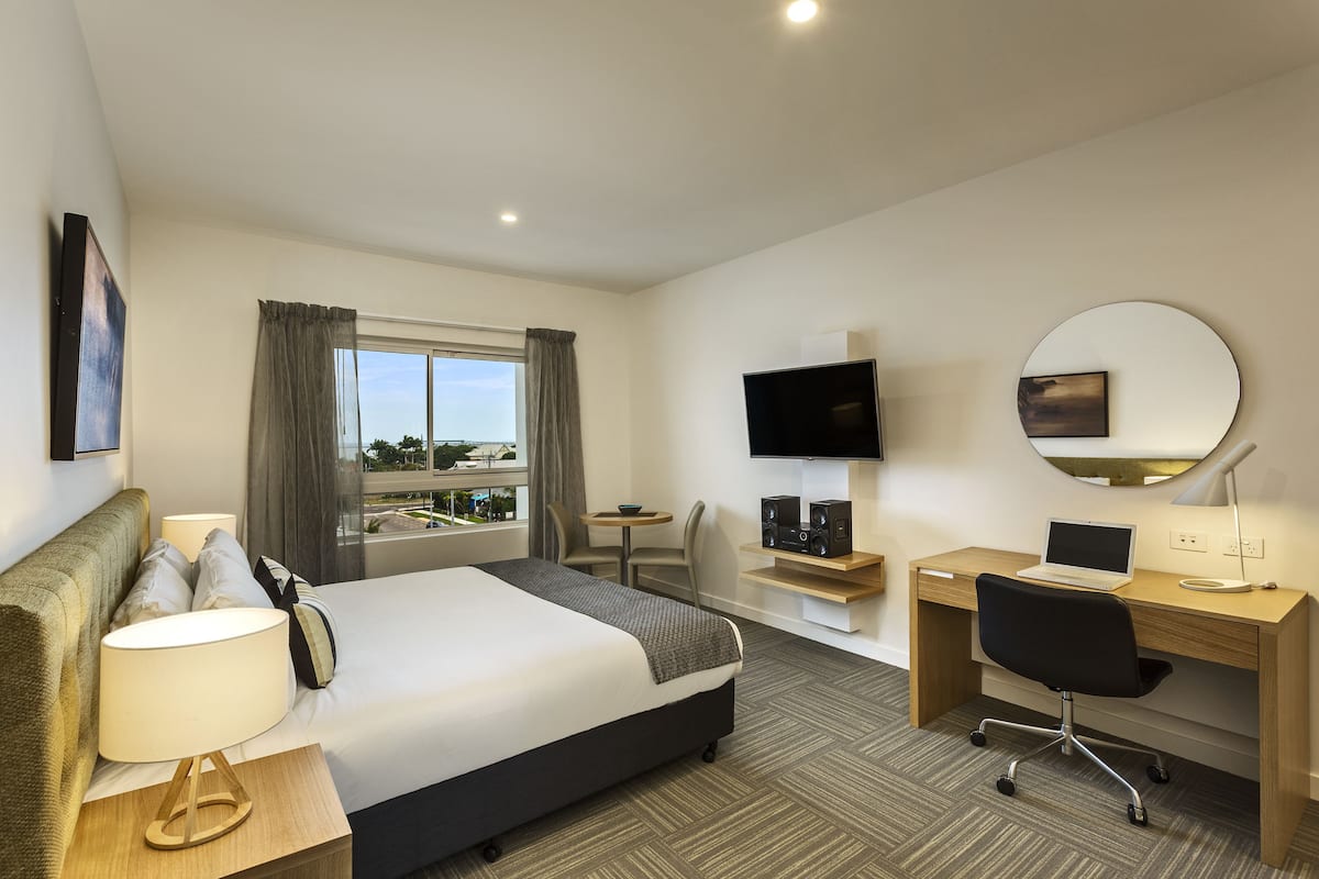 standard studio (studio apartment) | in-room safe, desk, laptop workspace, blackout curtains