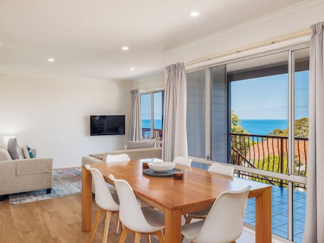 Superior Apartment, 2 Bedrooms, Jetted Tub, Ocean View | Living area | 26-inch LCD TV with digital channels, TV, DVD player