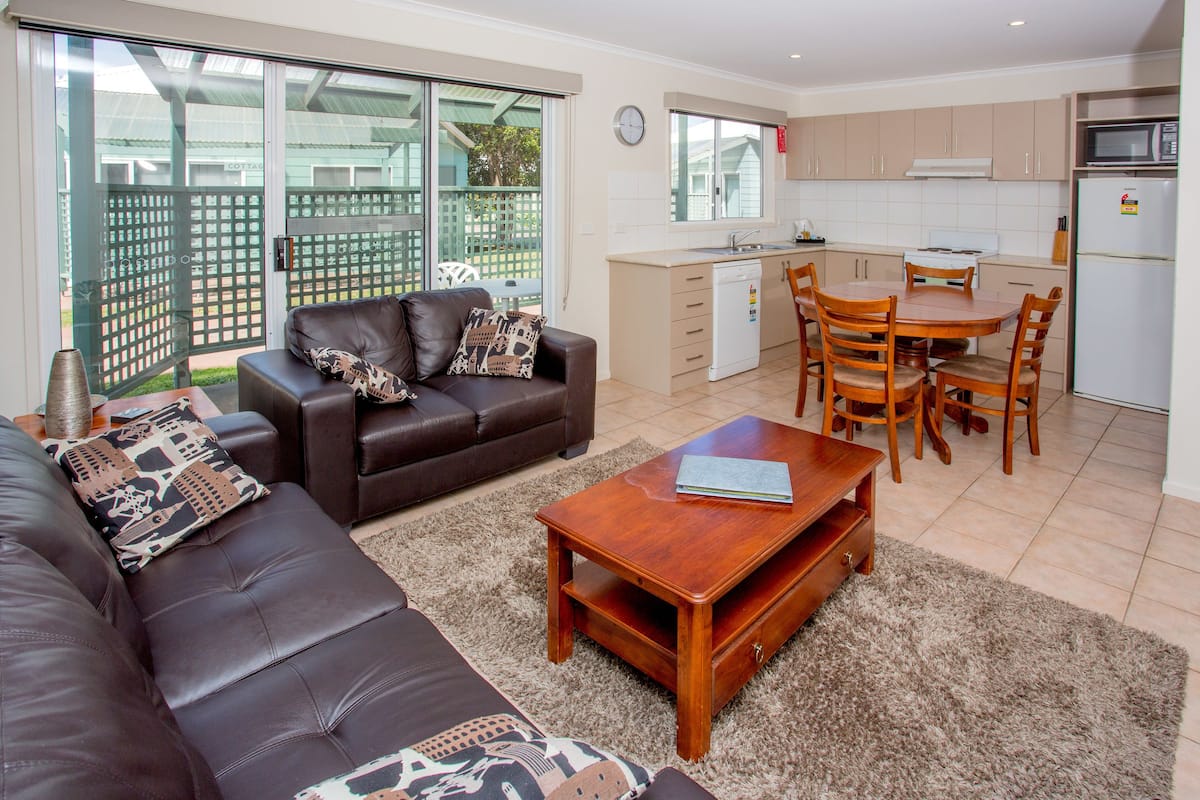 Garden Cottage | Living area | 30-inch TV with cable channels