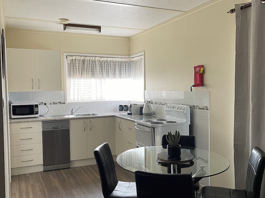Two Bedroom Apartment | Living area | 42-inch Smart TV with cable channels