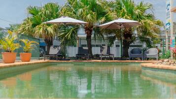Outdoor pool, pool umbrellas, sun loungers