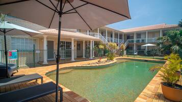 Outdoor pool, pool umbrellas, pool loungers