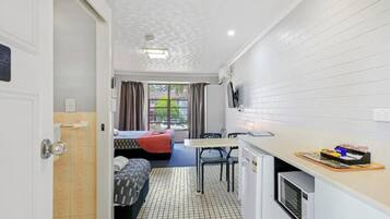 Queen + Single | Private kitchenette | Fridge, microwave, electric kettle, cookware/dishes/utensils