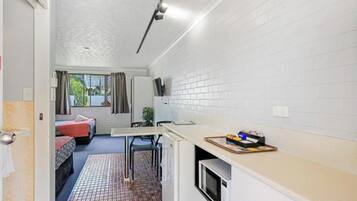 Queen + Queen | Private kitchenette | Fridge, microwave, electric kettle, cookware/dishes/utensils