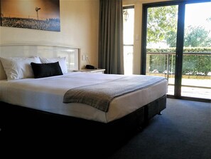 Desk, laptop workspace, blackout curtains, iron/ironing board